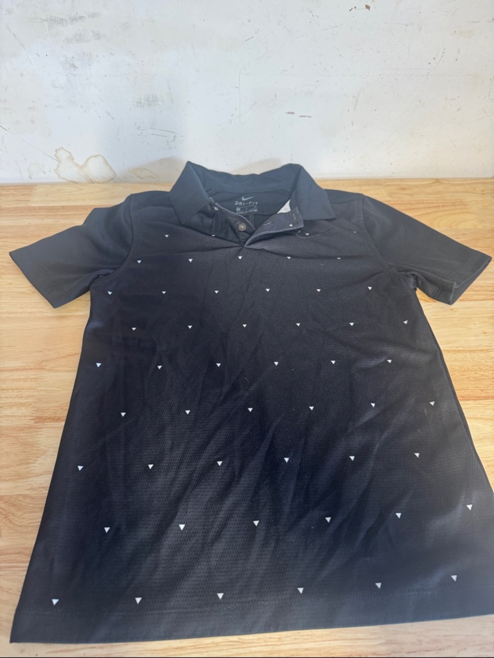 Nike Black Polo with Small White Triangle Print